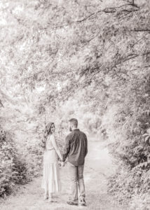Couple walks through Forest