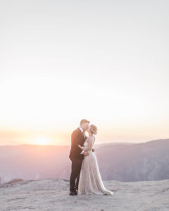 Bride and Groom kiss at sunset in Yosemite California