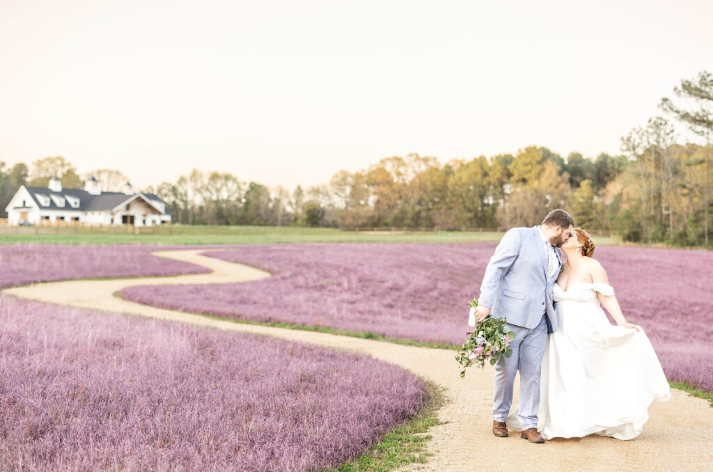 Bride and Groom walk through Lavender field